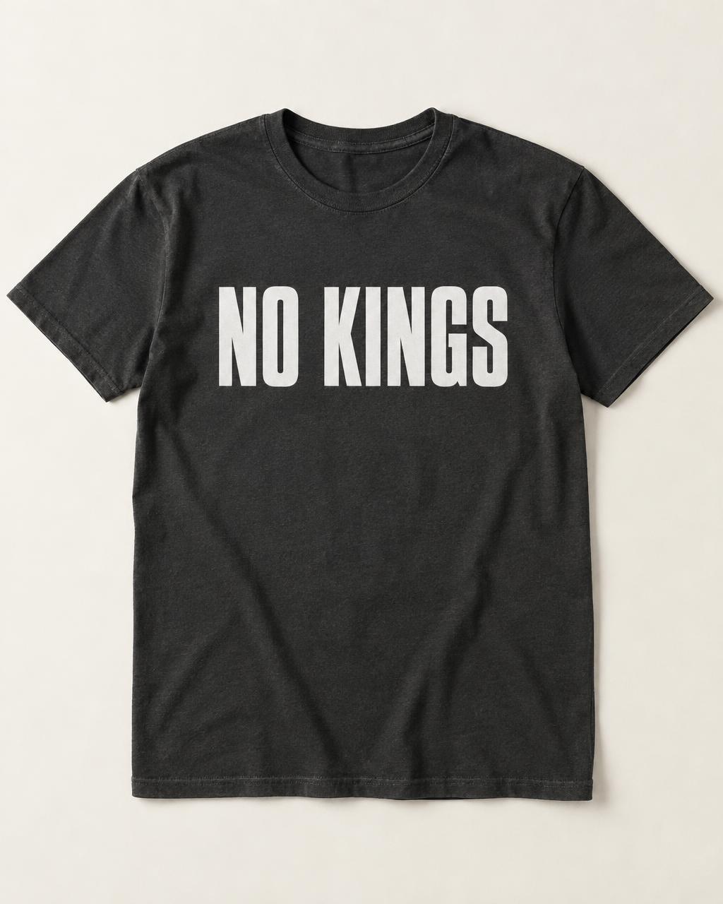 Concept mockup: charcoal tee printed with NO KINGS in bold white type